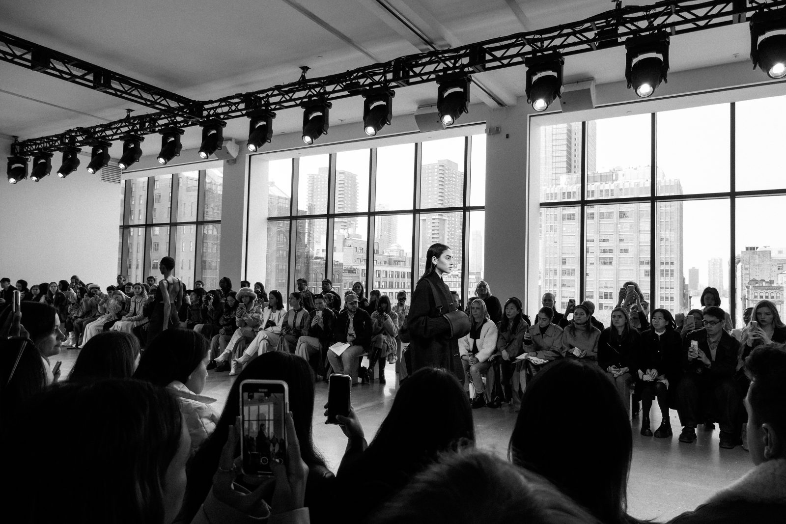 Model walking runway at New York Fashion Week