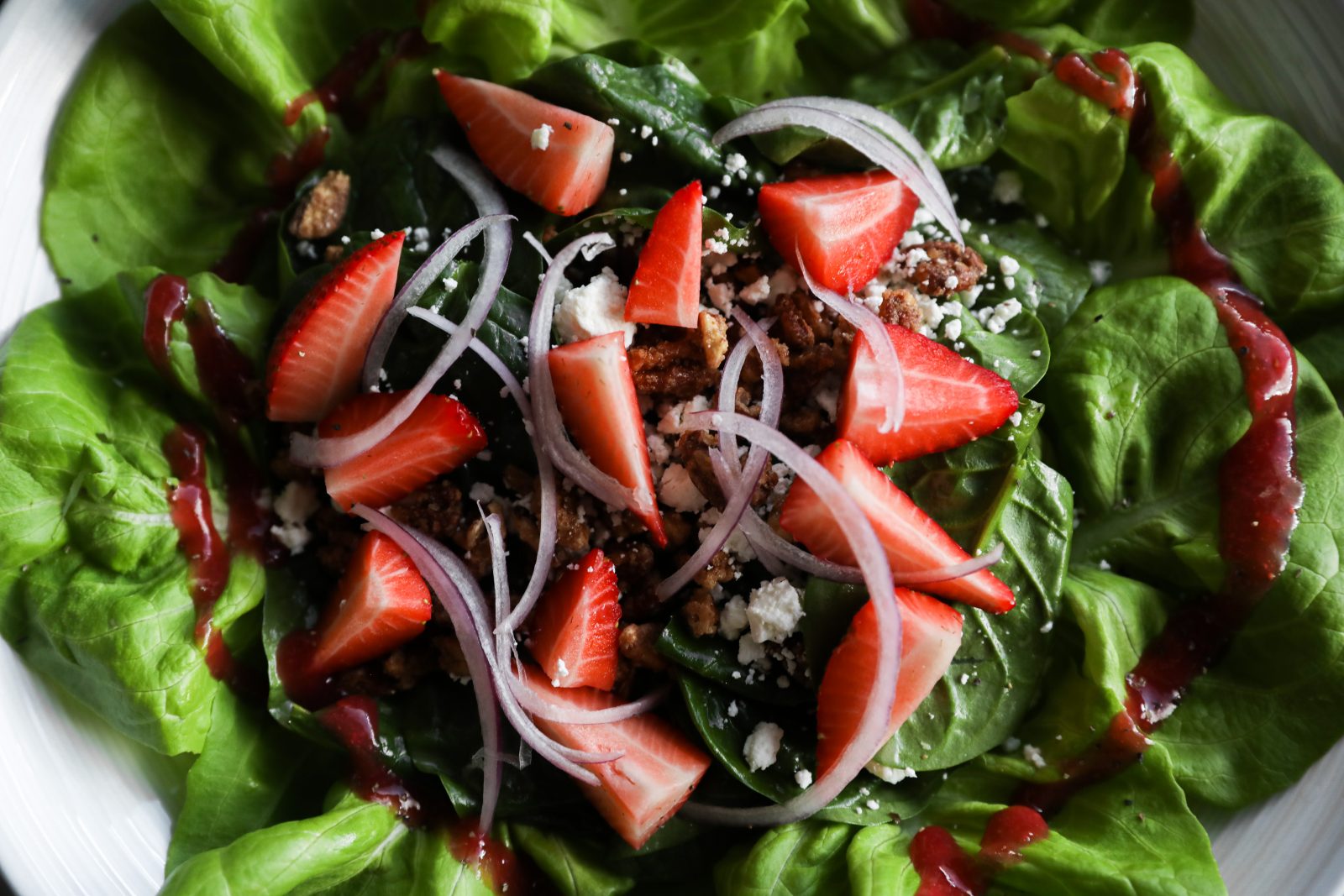Strawberry spinach salad with fresh onion at E3 Chophouse