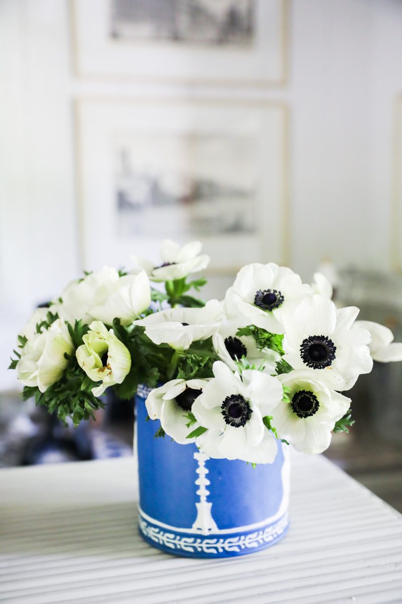 White poppies in a blue and white ceramic jar